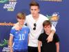 TREBLE TROUBLE: Cruz with brothers Romeo and Brooklyn Beckham