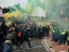 Flares were let off as tempers rose during the protests by fans yesterday Credit: AFP
