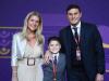 Former Argentine footballer Javier Zanetti, his wife Paula, and son Tomas arrive for the draw