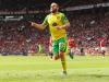 Teemu Pukki races off in celebration after firing Norwick level against United Credit: Rex 