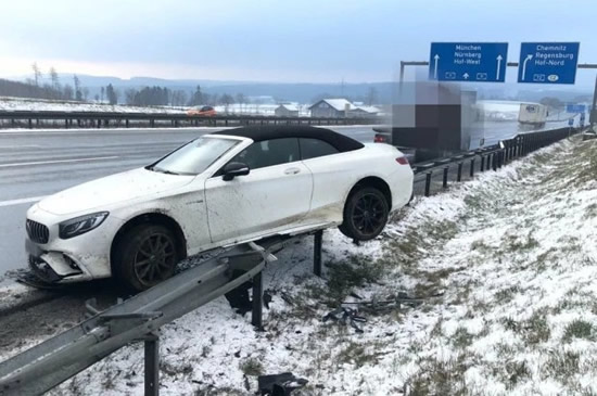 FOOTY ACE'S £22K CRASH Bayern ace Boateng crashes Mercedes into motorway barrier on way back from seeing ill son, causing more than £22k damage