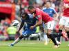 Patrice Evra and Victor Moses keep their eyes on the ball