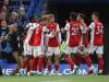 Arsenal celebrate opening the scoring Credit: Jamie McPhilimey