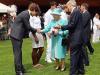 Her Majesty meeting Roger Federer 12 years ago Credit: AFP